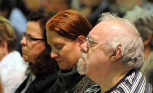 Synod Delegates listen intently to the Charge